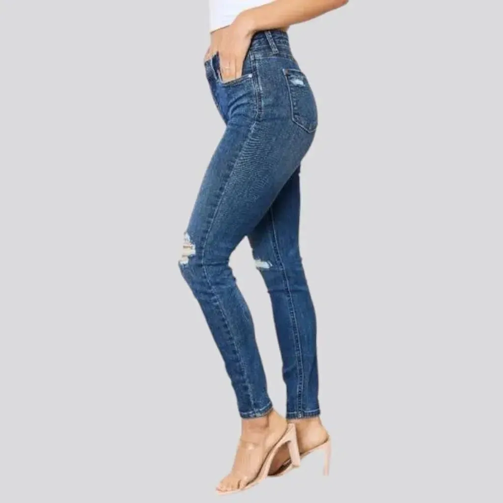 Distressed women's jeans