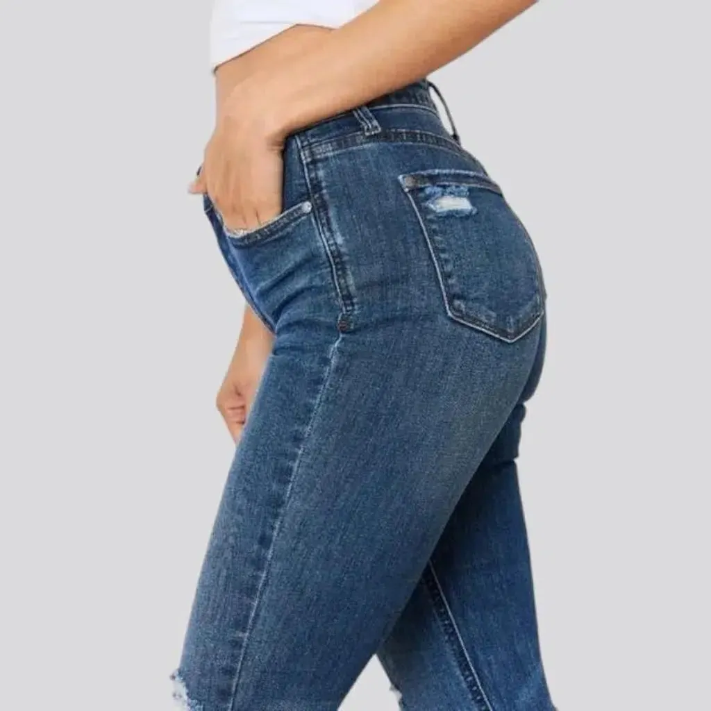 Distressed women's jeans